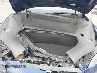 2022 Tesla Model S z VIN 5YJSA1E55NF493604, wystawiony jako IAAI lot #42503731 z przebiegiem 37 961 mil mil oraz . Historia ofert i sprzedaży dostępna na DreamBid. Obrazek 10.