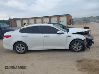 2017 Kia Optima LX z VIN KNAGT4L32H5149511, wystawiony jako IAAI lot #42087537 z przebiegiem 126 666 mil mil oraz . Historia ofert i sprzedaży dostępna na DreamBid. Obrazek 13.