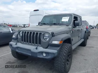 2020 Jeep Gladiator Sport S z VIN 1C6HJTAG4LL153441, wystawiony jako IAAI lot #42052329 z przebiegiem 34 660 mil mil oraz . Historia ofert i sprzedaży dostępna na DreamBid. Obrazek 18.