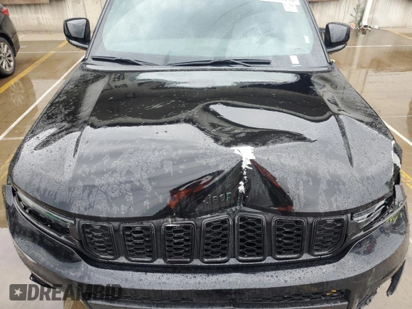 2023 Jeep Grand Cherokee Laredo with VIN 1C4RJKAG9P8829088, listed as a Copart auction lot 60099345 with 83,319 mi miles and Salvage title. Bid and sale history available at DreamBid. Image 12.