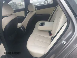 2016 Kia Optima SXL Turbo z VIN 5XXGV4L24GG085759, wystawiony jako IAAI lot #42179979 z przebiegiem 105 318 mil mil oraz . Historia ofert i sprzedaży dostępna na DreamBid. Obrazek 8.