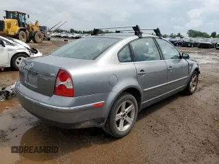 2004 Volkswagen Passat GLX with VIN WVWRH63B84P107858, listed as a Copart auction lot 62022524 with 141,500 mi miles and Salvage title. Bid and sale history available at DreamBid. Image 3.