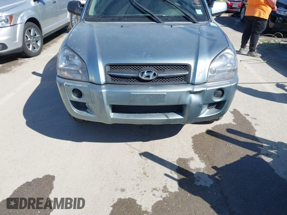2006 Hyundai Tucson GL with VIN KM8JM12B76U276847, listed as a IAAI auction lot 41767240 with 204,713 mi miles. Bid and sale history available at carsss.com. Image 6.
