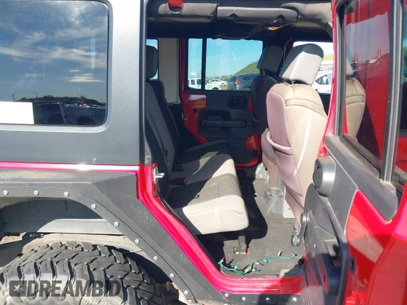 2007 Jeep Wrangler Unlimited X with VIN 1J4GA39147L157588, listed as a IAAI auction lot 41637089 with 87,812 mi miles and . Bid and sale history available at DreamBid. Image 8.