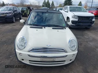 2006 MINI Convertible with VIN WMWRF33566TF65410, listed as a IAAI auction lot 40813052 with 131,109 mi miles and . Bid and sale history available at DreamBid. Image 12.