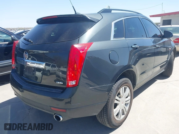 2014 Cadillac SRX z VIN 3GYFNAE35ES610751, wystawiony jako IAAI lot #41832296 z przebiegiem 133 293 mil mil oraz . Historia ofert i sprzedaży dostępna na DreamBid. Obrazek 4.