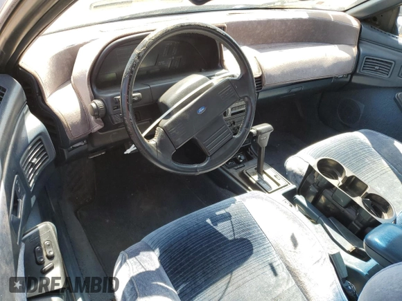 1989 Ford Probe z VIN 1ZVBT21C9K5202343, wystawiony jako Copart lot #55885985 z przebiegiem 150 457 mil mil oraz Czysty tytuł • Clean title. Historia ofert i sprzedaży dostępna na DreamBid. Obrazek 8.