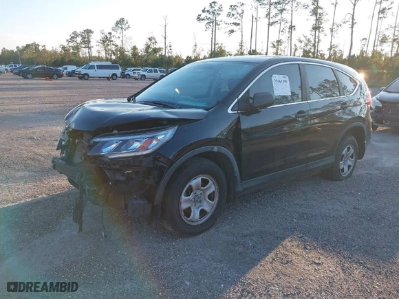 2015 Honda CR-V LX with VIN 2HKRM3H38FH512323, listed as a IAAI auction lot 39161499 with 133,787 mi miles. Bid and sale history available at carsss.com. Image 2.