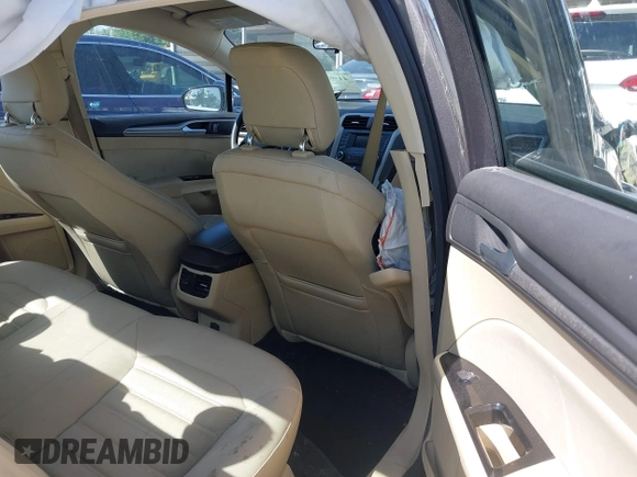2014 Ford Fusion SE with VIN 3FA6P0HD8ER217256, listed as a IAAI auction lot 41991177 with 77,612 mi miles and . Bid and sale history available at DreamBid. Image 8.