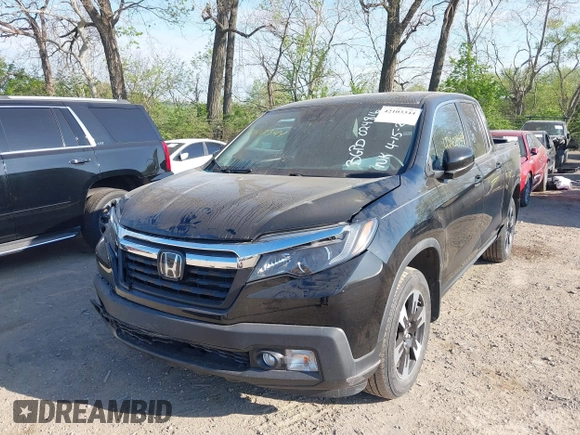 2020 Honda Ridgeline RTL with VIN 5FPYK3F52LB024816, listed as a IAAI auction lot 42103344 with 68,700 mi miles and . Bid and sale history available at DreamBid. Image 17.