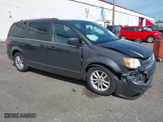 2019 Dodge Grand Caravan SXT with VIN 2C4RDGCG5KR758602, listed as a IAAI auction lot 42033617 with 186,351 mi miles. Bid and sale history available at carsss.com. Image 1.