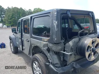 2020 Jeep Wrangler Unlimited Black and Tan with VIN 1C4HJXDG3LW298223, listed as a IAAI auction lot 42446032 with 17,688 mi miles and . Bid and sale history available at DreamBid. Image 3.