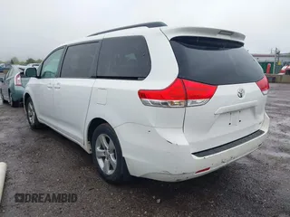 2012 Toyota Sienna LE AAS with VIN 5TDKK3DC3CS208853, listed as a IAAI auction lot 42205012 with 197,286 mi miles. Bid and sale history available at carsss.com. Image 3.