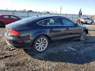 2014 Audi A7 Prestige with VIN WAU2MAFC9EN093287, listed as a Copart auction lot 86430124 with 157,212 mi miles and Salvage title. Bid and sale history available at DreamBid. Image 3.