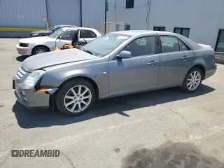 2005 Cadillac STS z VIN 1G6DC67A050197269, wystawiony jako Copart lot #60577435 z przebiegiem 152 527 mil mil oraz Szkoda całkowita • Salvage title. Historia ofert i sprzedaży dostępna na DreamBid. Obrazek 1.