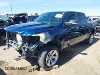2019 Ram 1500 Big Horn/Lone Star with VIN 1C6SRFFT5KN598456, listed as a IAAI auction lot 41840921 with 154,124 mi miles. Bid and sale history available at carsss.com. Image 2.