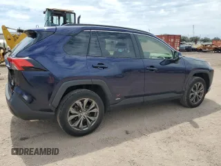 2023 Toyota RAV4 Hybrid XLE Premium z VIN JTMB6RFV1PD100836, wystawiony jako Copart lot #51694985 z przebiegiem 19 870 mil mil oraz Szkoda całkowita • Salvage title. Historia ofert i sprzedaży dostępna na DreamBid. Obrazek 3.