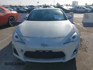 2016 Scion FR-S with VIN JF1ZNAA17G9707484, listed as a IAAI auction lot 41857022 with 53,431 mi miles. Bid and sale history available at carsss.com. Image 12.