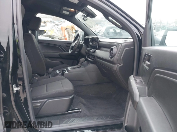 2023 Chevrolet Colorado 4WD Work Truck z VIN 1GCGTBEC4P1198879, wystawiony jako IAAI lot #41322797 z przebiegiem 13 414 mil mil oraz . Historia ofert i sprzedaży dostępna na DreamBid. Obrazek 5.