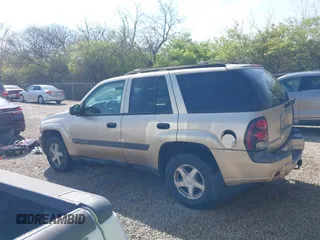 2004 Chevrolet TrailBlazer LT with VIN 1GNDS13S142422830, listed as a IAAI auction lot 42054144 with 218,042 mi miles and . Bid and sale history available at DreamBid. Image 14.