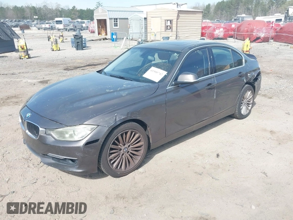 2013 BMW 3 Series 335i with VIN WBA3A9C51DF476537, listed as a IAAI auction lot 41900742 with 184,094 mi miles and . Bid and sale history available at DreamBid. Image 2.