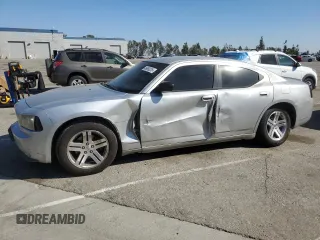 2006 Dodge Charger with VIN 2B3KA43G56H390329, listed as a Copart auction lot 46658235 with 252,522 mi miles and Salvage Title. Bid and sale history available at DreamBid. Image 1.