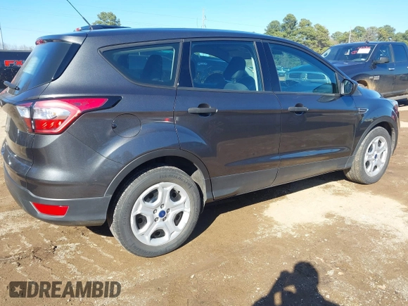 2018 Ford Escape S with VIN 1FMCU0F77JUA84538, listed as a IAAI auction lot 41611602 with 28,284 mi miles and . Bid and sale history available at carsss.com. Image 4.