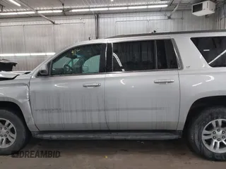 2018 Chevrolet Suburban LT z VIN 1GNSKHKC2JR201282, wystawiony jako IAAI lot #41312994 z przebiegiem 99 783 mil mil oraz . Historia ofert i sprzedaży dostępna na DreamBid. Obrazek 15.