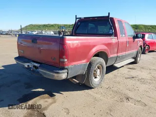 2001 Ford Super Duty F-250 XL with VIN 1FTNX20LX1EB05530, listed as a IAAI auction lot 41759178 with 249,349 mi miles. Bid and sale history available at carsss.com. Image 4.