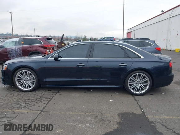 2017 Audi A8 L Sport with VIN WAU43AFD1HN007334, listed as a IAAI auction lot 41760035 with 67,342 mi miles. Bid and sale history available at carsss.com. Image 14.