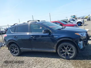 2018 Toyota RAV4 Hybrid SE with VIN JTMJJREV9JD191552, listed as a IAAI auction lot 42158665 with 84,025 mi miles and . Bid and sale history available at DreamBid. Image 13.