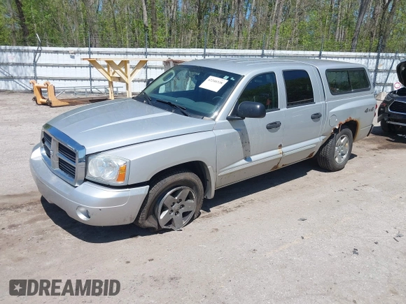 2005 Dodge Dakota SLT with VIN 1D7HW48N45S321002, listed as a IAAI auction lot 42240338 with 214,983 mi miles and . Bid and sale history available at DreamBid. Image 2.