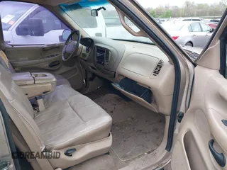 1998 Ford F-150 с VIN 1FTZX17W6WNB66022, выставлен на аукционе IAAI как лот 41890478 с пробегом 245 651 миль миль и . История ставок и продаж доступна на DreamBid. Изображение 5.