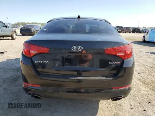 2011 Kia Optima EX z VIN KNAGN4A79B5183789, wystawiony jako Copart lot #59018985 z przebiegiem 203 137 mil mil oraz Szkoda całkowita • Salvage title. Historia ofert i sprzedaży dostępna na DreamBid. Obrazek 6.