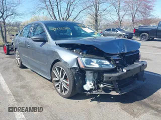 2014 Volkswagen Jetta GLI с VIN 3VW4T7AJ6EM360187, выставлен на аукционе IAAI как лот 41932099 с пробегом 71 647 миль миль и . История ставок и продаж доступна на DreamBid. Изображение 1.