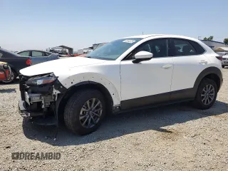 2020 Mazda CX-30 with VIN 3MVDMBBL0LM129803, listed as a Copart auction lot 62544575 with 74,681 mi miles and Salvage title. Bid and sale history available at DreamBid. Image 1.