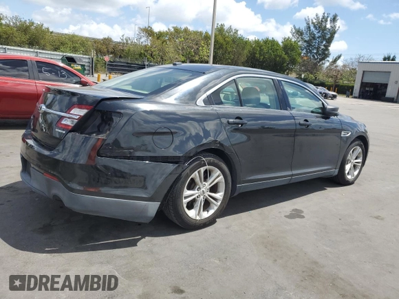 2015 Ford Taurus SE with VIN 1FAHP2D86FG140750, listed as a Copart auction lot 54390145 with 128,163 mi miles and Salvage Title. Bid and sale history available at carsss.com. Image 3.