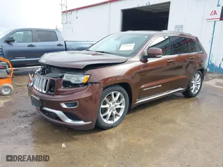 2015 Jeep Grand Cherokee Summit with VIN 1C4RJFJT7FC840560, listed as a IAAI auction lot 41596868 with 173,392 mi miles. Bid and sale history available at carsss.com. Image 2.