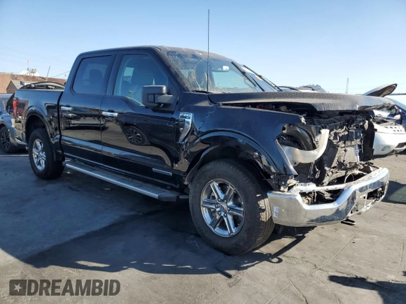 2024 Ford F-150 XLT with VIN 1FTFW3LD1RFA75938, listed as a Copart auction lot 78947444 with 14,674 mi miles and Salvage Title. Bid and sale history available at carsss.com. Image 4.