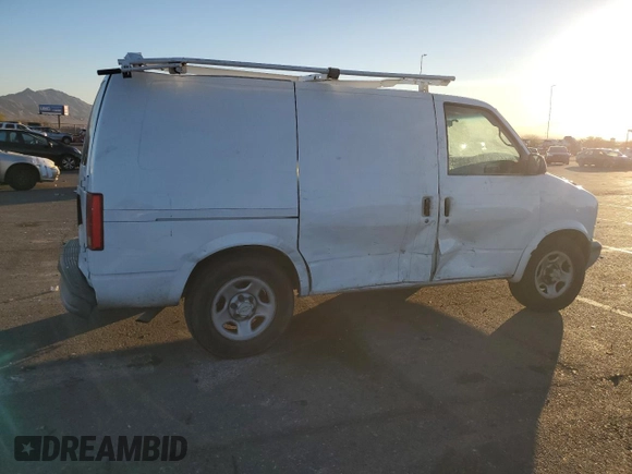 2005 Chevrolet Astro Cargo z VIN 1GCDM19X75B129778, wystawiony jako Copart lot #51354005 z przebiegiem 152 893 mil mil oraz Szkoda całkowita • Salvage title. Historia ofert i sprzedaży dostępna na DreamBid. Obrazek 3.