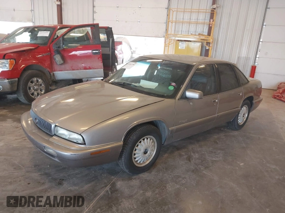 1996 Buick Regal Custom z VIN 2G4WB52M2T1462761, wystawiony jako IAAI lot #42483788 z przebiegiem 156 925 mil mil oraz . Historia ofert i sprzedaży dostępna na DreamBid. Obrazek 2.
