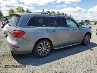 2014 Mercedes-Benz GL 450 with VIN 4JGDF7CE7EA272364, listed as a Copart auction lot 62952615 with 146,621 mi miles and Clean title. Bid and sale history available at DreamBid. Image 3.
