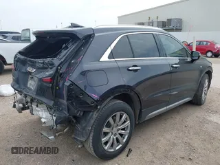 2023 Cadillac XT4 FWD Premium Luxury with VIN 1GYFZCR4XPF101409, listed as a IAAI auction lot 41891293 with 29,355 mi miles and . Bid and sale history available at carsss.com. Image 4.