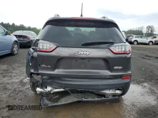 2019 Jeep Cherokee Altitude with VIN 1C4PJMLX1KD471582, listed as a Copart auction lot 55729055 with 76,941 mi miles and Salvage title. Bid and sale history available at DreamBid. Image 6.