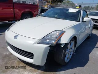 2005 Nissan 350Z Touring z VIN JN1AZ36A45M759863, wystawiony jako IAAI lot #41989643 z przebiegiem 36 758 mil mil oraz . Historia ofert i sprzedaży dostępna na DreamBid. Obrazek 2.