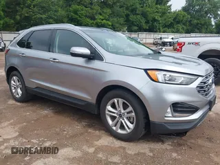 2020 Ford Edge SEL with VIN 2FMPK3J91LBA73951, listed as a IAAI auction lot 42512428 with 107,518 mi miles and . Bid and sale history available at DreamBid. Image 1.