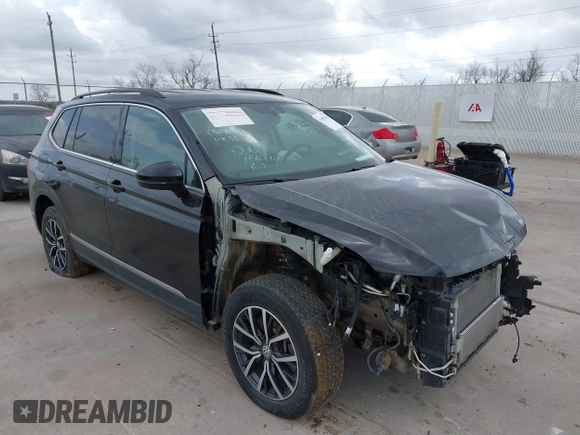 2020 Volkswagen Tiguan SE with VIN 3VV3B7AX7LM067046, listed as a IAAI auction lot 41697405 with 53,573 mi miles and . Bid and sale history available at DreamBid. Image 1.