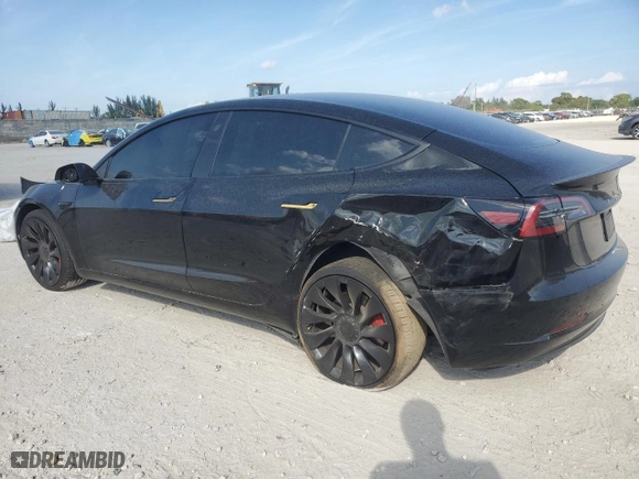 2023 Tesla Model 3 Performance with VIN 5YJ3E1ECXPF693419, listed as a Copart auction lot 49379795 with 36,652 mi miles and Salvage Title. Bid and sale history available at carsss.com. Image 2.