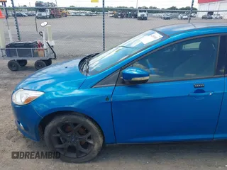 2013 Ford Focus SE z VIN 1FADP3F29DL300041, wystawiony jako IAAI lot #42361903 z przebiegiem 160 537 mil mil oraz . Historia ofert i sprzedaży dostępna na DreamBid. Obrazek 6.