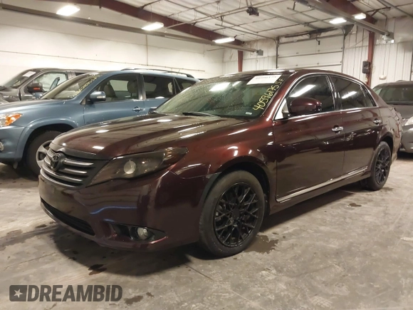 2011 Toyota Avalon with VIN 4T1BK3DB4BU433408, listed as a IAAI auction lot 40596175 with 123,529 mi miles and . Bid and sale history available at carsss.com. Image 21.